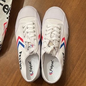 Men’s Feiyue loafer shoes in Red White and Blue.